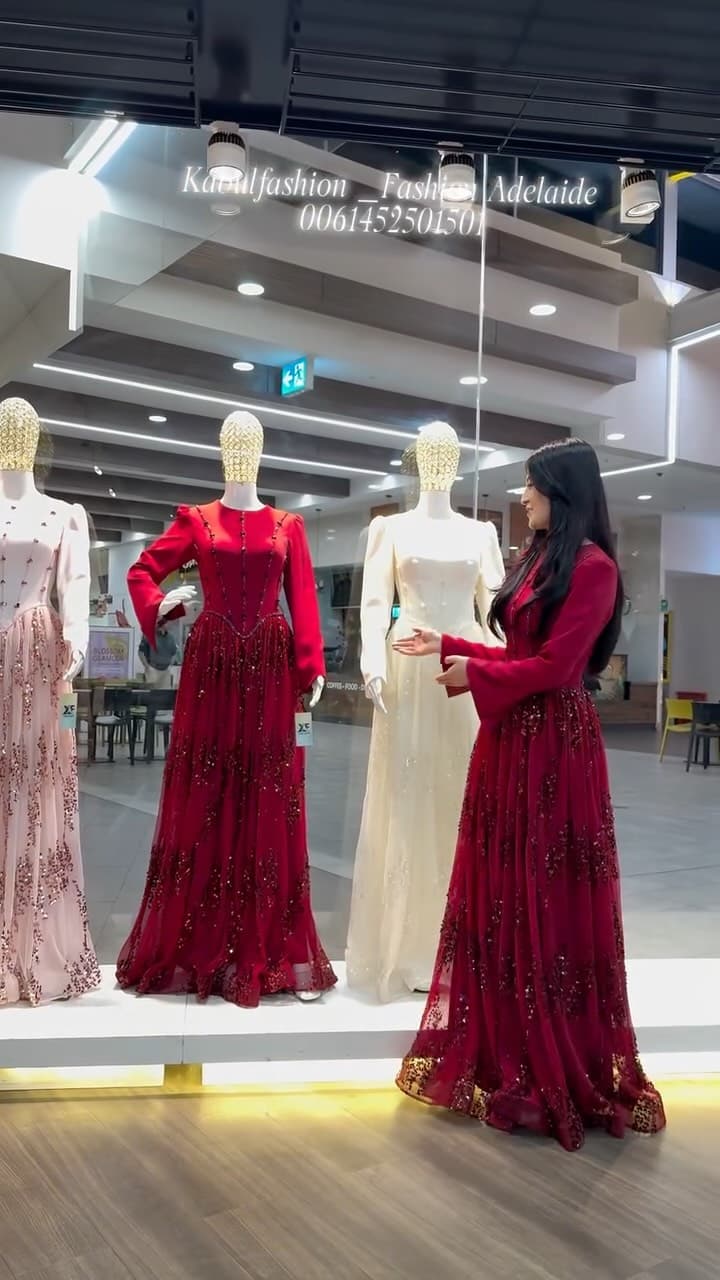 Sapphire Mirror-Work Festival Dress — Afghan dress from Kabul Fashion Adelaide, showing mannequin, gown, display case, dress.